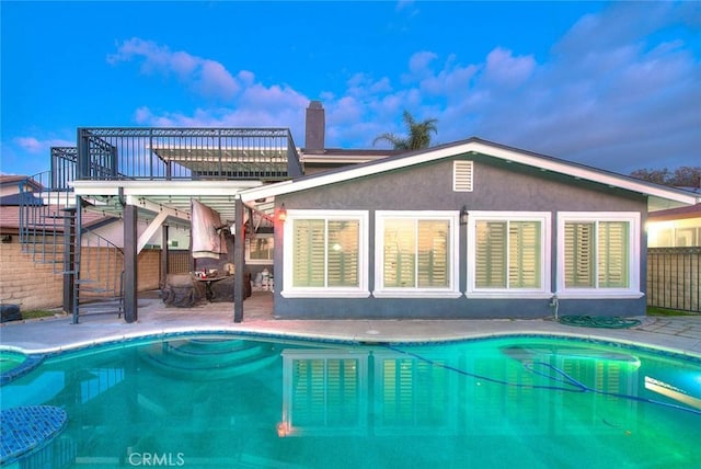 rear view of house featuring a patio area