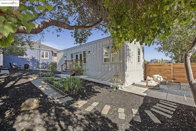 view of front of property featuring a patio