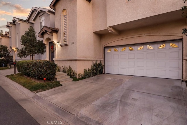 view of front of home with a garage