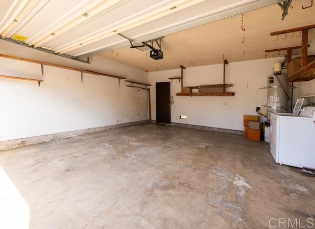 garage with washer and dryer, water heater, and a garage door opener