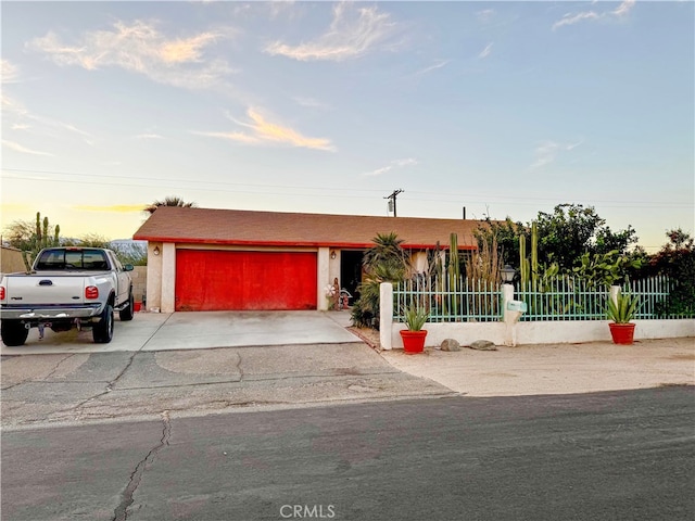 view of front of property with a garage