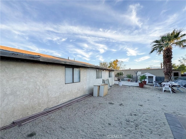 rear view of property with a patio