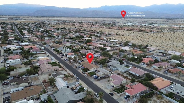 drone / aerial view featuring a mountain view