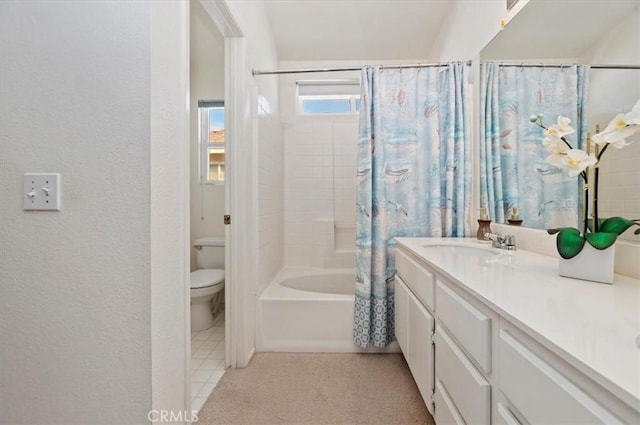 full bathroom featuring toilet, vanity, and shower / bath combination with curtain