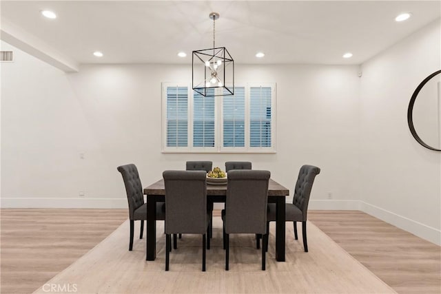 dining room with light wood-type flooring