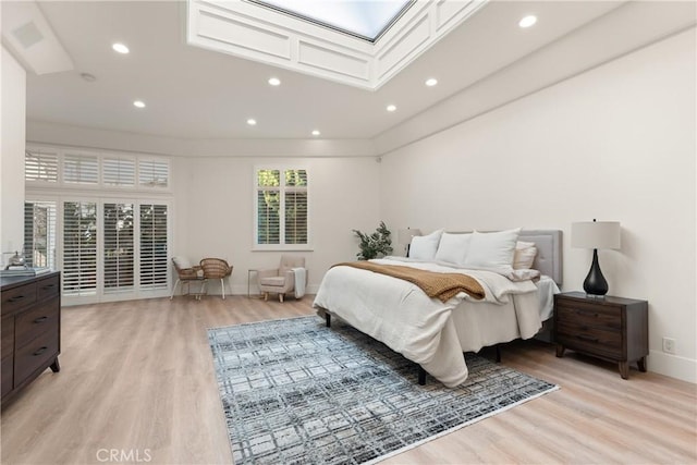 bedroom with light hardwood / wood-style flooring