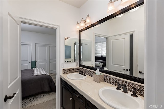 bathroom with backsplash and vanity