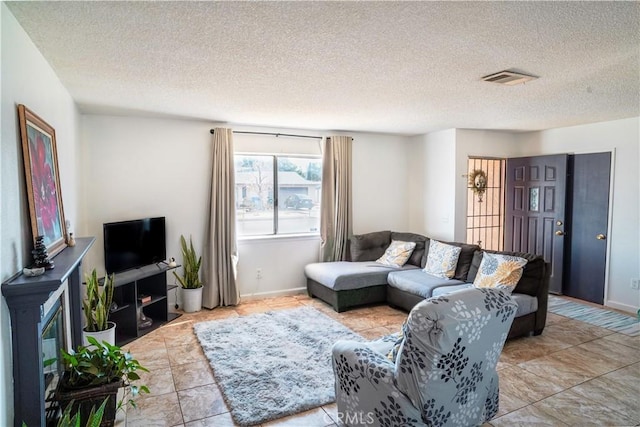 living room with a textured ceiling