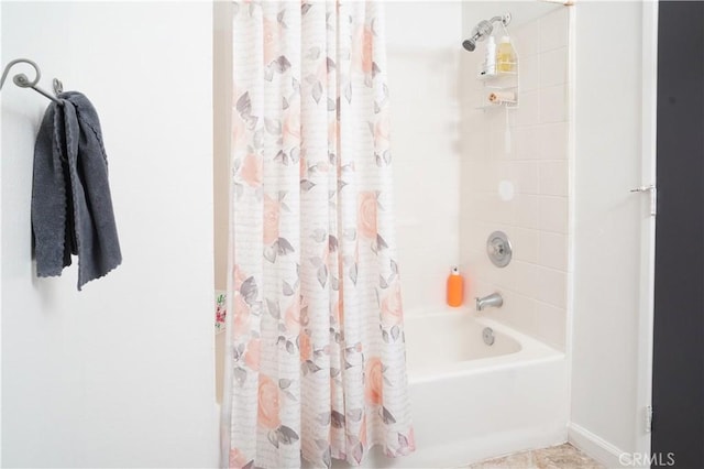 bathroom featuring shower / tub combo with curtain