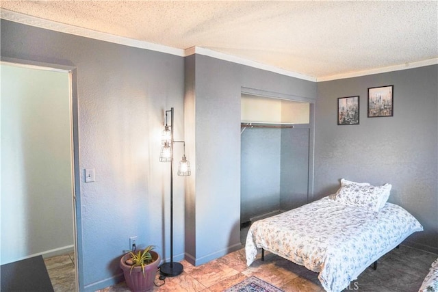 bedroom with crown molding, a closet, and a textured ceiling