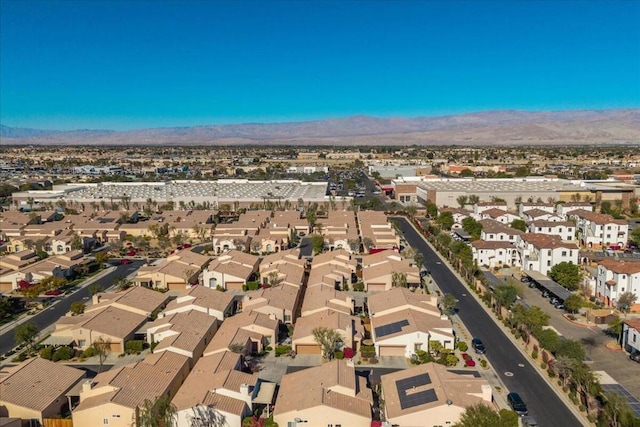 drone / aerial view featuring a mountain view