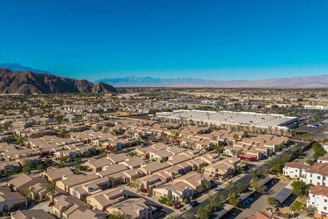 drone / aerial view featuring a mountain view