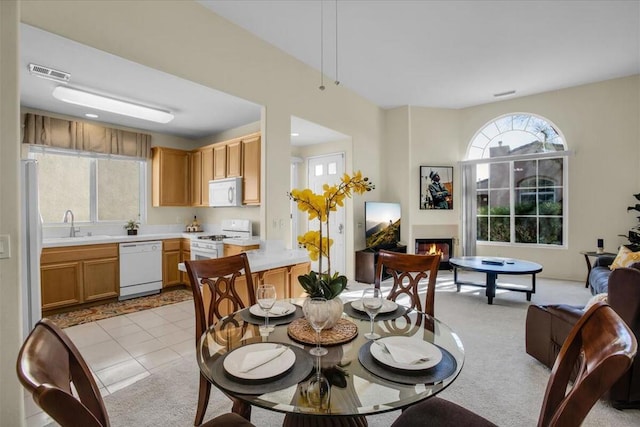 tiled dining area with sink