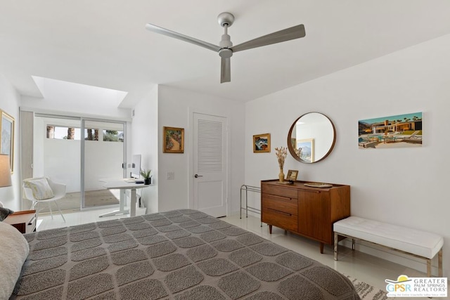 bedroom featuring ceiling fan and a closet