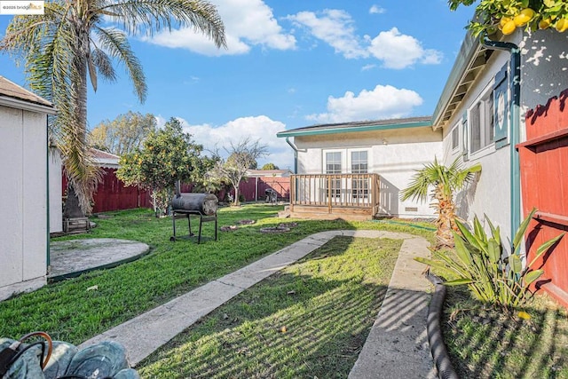 view of yard featuring a deck