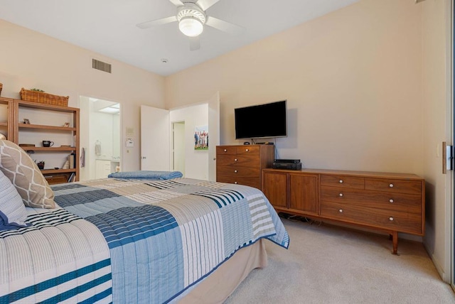 bedroom with ceiling fan and light colored carpet