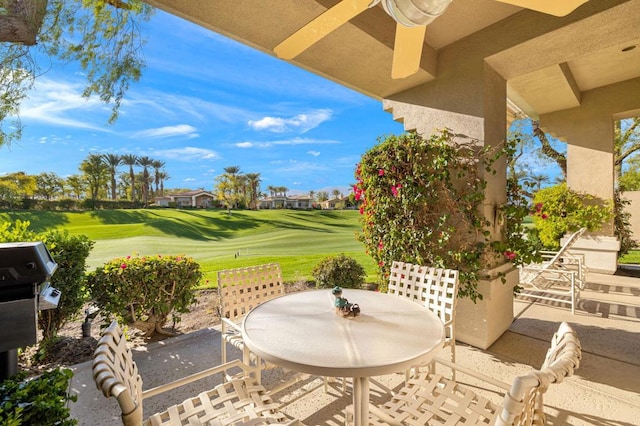 view of patio / terrace featuring area for grilling and ceiling fan