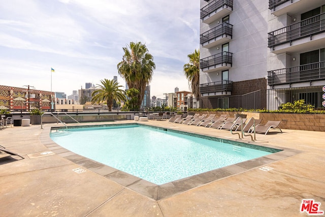 view of pool with a patio area