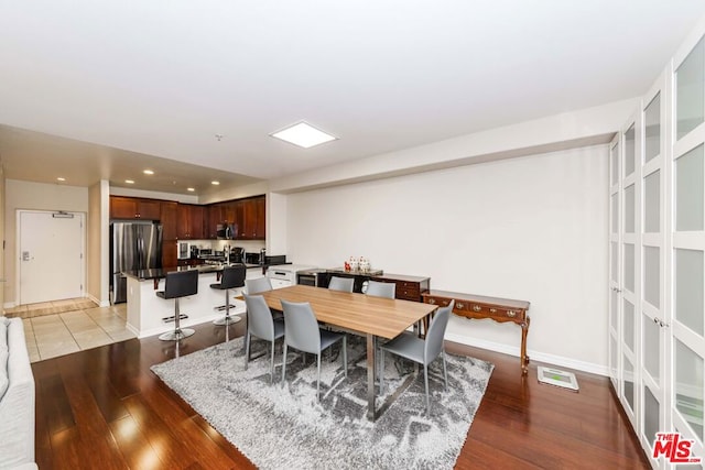 dining room featuring light hardwood / wood-style flooring