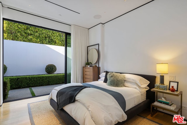 bedroom featuring light hardwood / wood-style flooring