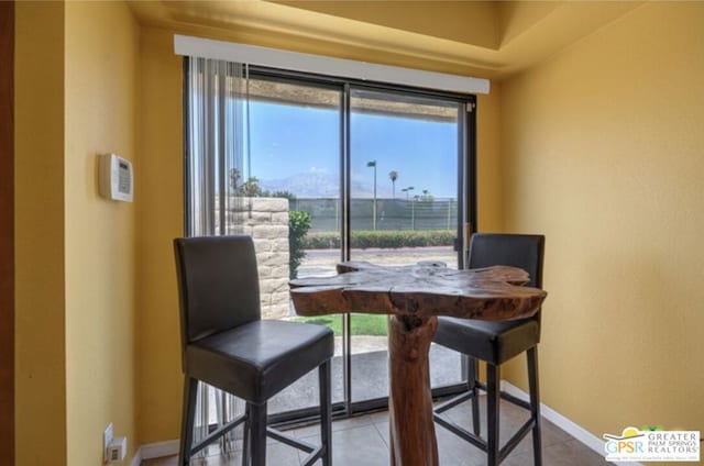 view of tiled dining space