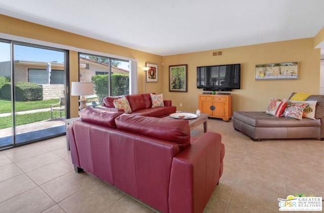 living room featuring light tile patterned floors