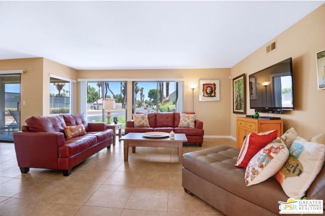 living room featuring light tile patterned floors