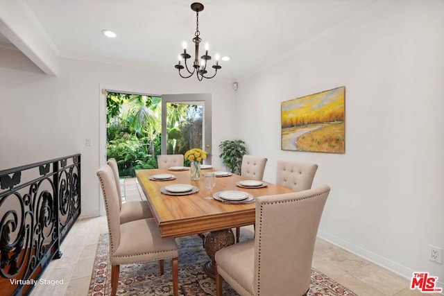 dining space with an inviting chandelier and ornamental molding