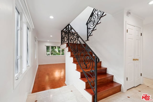 stairs with tile patterned flooring