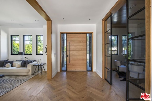 foyer entrance with parquet floors