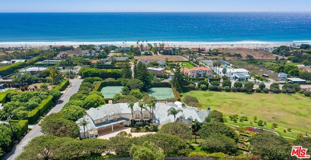 bird's eye view with a water view and a view of the beach