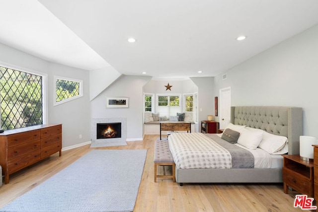 bedroom with light hardwood / wood-style floors