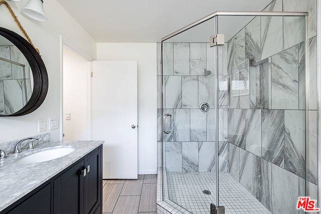 bathroom featuring vanity and walk in shower