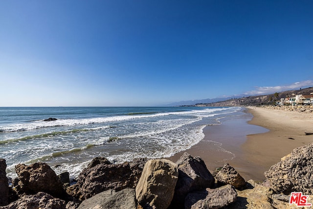 view of water feature with a view of the beach