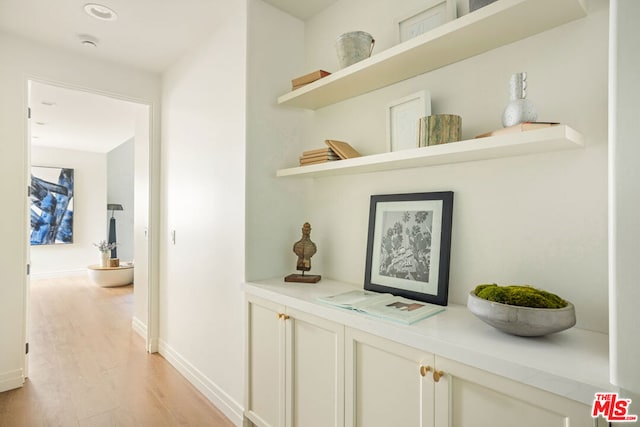 hallway featuring light hardwood / wood-style floors