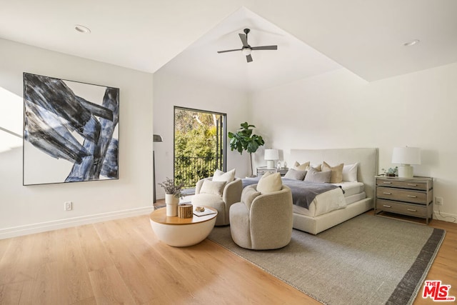 bedroom with hardwood / wood-style flooring and ceiling fan