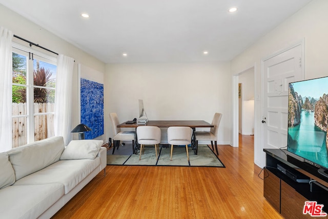 dining space featuring light hardwood / wood-style flooring