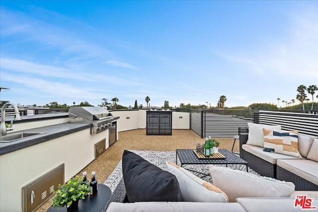 view of patio featuring an outdoor living space, area for grilling, grilling area, and sink