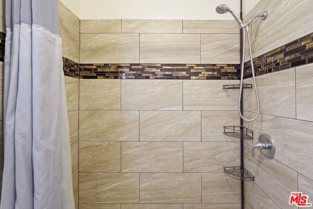 bathroom featuring walk in shower