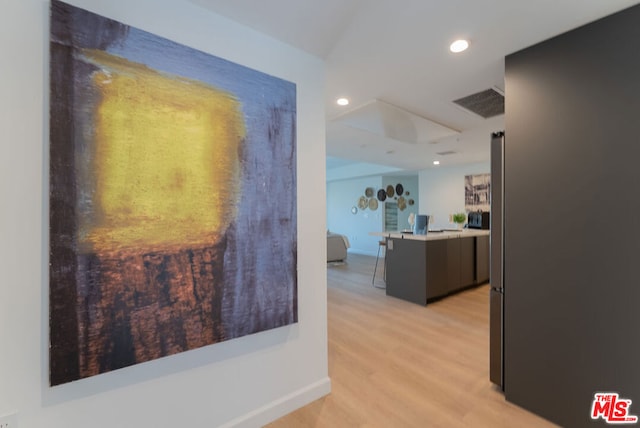 hallway with light wood-type flooring