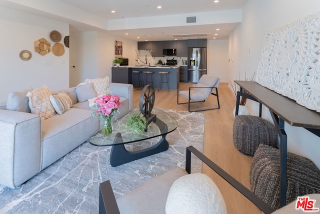 living room featuring light hardwood / wood-style floors