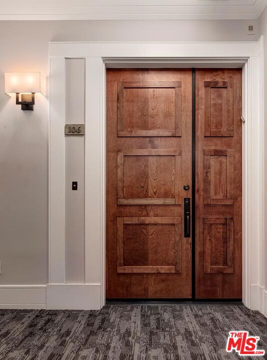 details with crown molding and hardwood / wood-style flooring