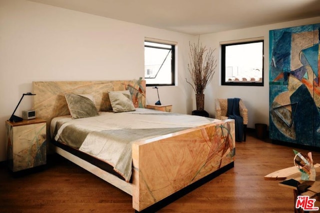 bedroom featuring hardwood / wood-style floors