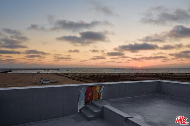 view of patio terrace at dusk