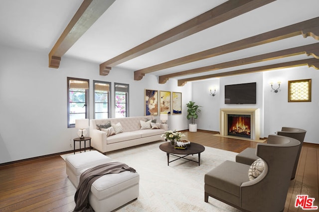 living room with beamed ceiling and light hardwood / wood-style flooring