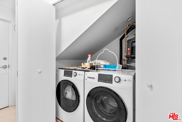 laundry room featuring washer and dryer