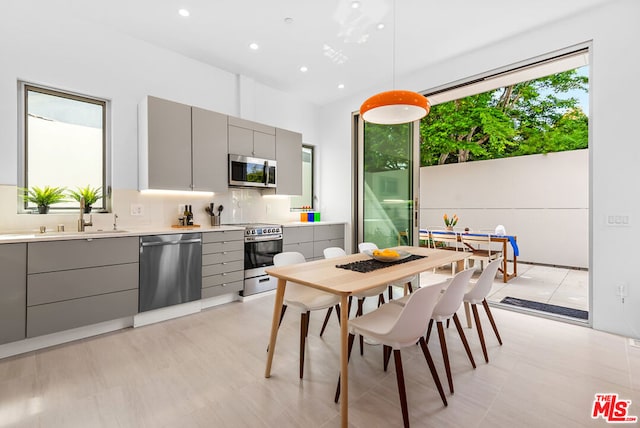 dining area featuring sink