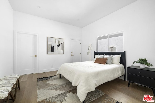 bedroom with wood-type flooring