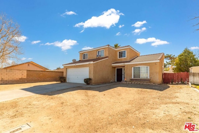 view of front of property with a garage