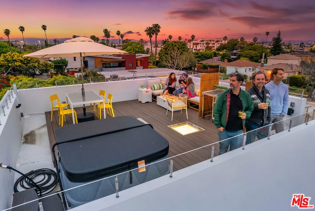 exterior space featuring a hot tub